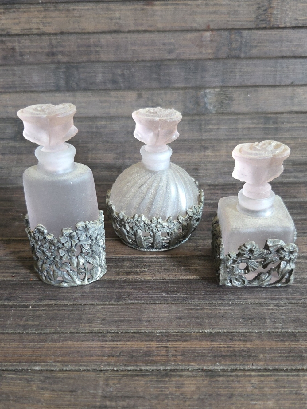 Trio Of Vintage Frosted Glass Perfume Bottles W/Ornate Metal Bases Rose Toppers